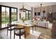 Inviting dining and living space with wood accents, modern furnishings, and ample natural light at 17 Cheney St, East Point, GA 30344