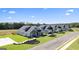 Luxury townhouses with attached garages and lush landscaping at 576 Parnassus Road, Locust Grove, GA 30248
