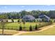 Community features a large grassy area with a black fence at 576 Parnassus Road, Locust Grove, GA 30248