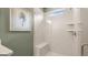 Walk-in shower with built-in seat and window at 576 Parnassus Road, Locust Grove, GA 30248