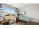 Bright bedroom with wood floors, featuring a window with a view and a twin-sized bed at 568 Parnassus Rd, Locust Grove, GA 30248