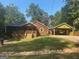 Charming single Gathering home with a large front yard and a detached carport at 171 Knucklesville Rd, Rydal, GA 30171