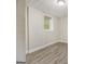 This basement features gray vinyl floors and a window at 770 Bridgewater Street Southwest W St, Atlanta, GA 30310