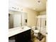 Clean bathroom with vanity, toilet, shower, and tasteful decor at 20 Streamside Dr, Covington, GA 30016