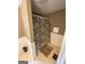 Simple bathroom with shower and neutral decor at 215 Sims St, Palmetto, GA 30268