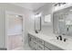 Modern double vanity bathroom with gray cabinets and quartz countertop at 3059 Bold Springs Rd, Dacula, GA 30019