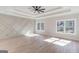 Bright main bedroom with wood floors and large windows at 3059 Bold Springs Rd, Dacula, GA 30019