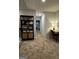 Hallway featuring a bookcase and a desk with modern style at 253 Ivey Ter # 48, Temple, GA 30179