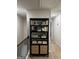Hallway with built-in bookcase with wicker basket inserts at 253 Ivey Ter # 48, Temple, GA 30179