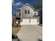 Charming two-story home featuring a two-car garage, gray siding, and a well-manicured lawn at 172 Weldon Rd # 19, Mcdonough, GA 30253