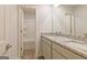 Bathroom featuring double sinks, granite countertops, modern faucets, and a view of the shower-tub combo at 180 Weldon Rd # 21, Mcdonough, GA 30253