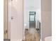 Bright bathroom with wood-look tile, white subway tile in shower and neutral color palette at 180 Weldon Rd # 21, Mcdonough, GA 30253