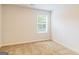 Bright bedroom featuring plush carpeting and a window with natural light at 180 Weldon Rd # 21, Mcdonough, GA 30253