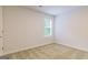 Bedroom with neutral carpet and a window letting in natural light at 180 Weldon Rd # 21, Mcdonough, GA 30253