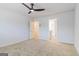 Bedroom featuring plush carpet, modern fan, and bathroom ensuite at 180 Weldon Rd # 21, Mcdonough, GA 30253
