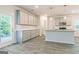 Bright kitchen featuring gray cabinets, granite countertops and stainless steel appliances at 180 Weldon Rd # 21, Mcdonough, GA 30253