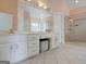Bright bathroom with double vanity, tile floors, and a glass-enclosed shower at 2560 Almont Way, Roswell, GA 30076