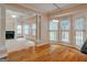 The eat-in breakfast nook provides abundant natural light from large windows and a door leading outside at 2560 Almont Way, Roswell, GA 30076