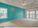 This main bedroom boasts a tray ceiling and a bay window for lots of light at 2560 Almont Way, Roswell, GA 30076