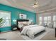 A spacious bedroom boasts a tray ceiling and a bay window seating area at 2560 Almont Way, Roswell, GA 30076
