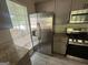 Kitchen with stainless steel refrigerator and gas range at 435 Ridgedale Way, Lawrenceville, GA 30044