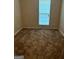 Bright bedroom with carpeted floor and window at 4403 Pinscher St, Union City, GA 30291