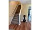 Carpeted staircase leading to the second floor at 4403 Pinscher St, Union City, GA 30291