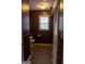 Small bathroom with wood-look floors and a window that provides natural light at 2884 Mountbery Dr, Snellville, GA 30039