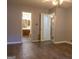 Bedroom with hardwood floors and bathroom access at 2884 Mountbery Dr, Snellville, GA 30039