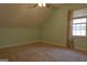 Bedroom featuring carpeted floors and a window with curtains at 2884 Mountbery Dr, Snellville, GA 30039