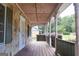 Charming front porch with decorative railings and stone accents for a welcoming entryway at 2884 Mountbery Dr, Snellville, GA 30039
