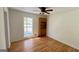 Bright bedroom with wood flooring and built-in shelving at 164 Glenloch Pkwy, Stockbridge, GA 30281