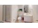 Neat bathroom with a modern vanity and a glass-enclosed shower, designed for comfort and convenience at 1461 Hada Ln, Lawrenceville, GA 30043