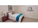 Inviting bedroom with a plush bed and soft lighting, ensuring a peaceful night's sleep at 1461 Hada Ln, Lawrenceville, GA 30043