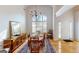 Dining room with cathedral ceiling, lots of natural light, and chandelier at 1461 Hada Ln, Lawrenceville, GA 30043