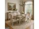Formal dining room with modern chandelier and stylish furnishings at 1461 Hada Ln, Lawrenceville, GA 30043