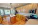 Open concept kitchen with wood cabinets, stainless appliances, and large center island at 1461 Hada Ln, Lawrenceville, GA 30043