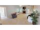 Bright living room with a stone fireplace and neutral decor that makes it welcoming and relaxing at 1461 Hada Ln, Lawrenceville, GA 30043