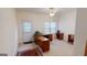 Bright and airy office space with a large desk and plenty of natural light, ideal for remote work at 1461 Hada Ln, Lawrenceville, GA 30043