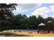 Community playground with swings, tennis courts, and play structures at 1461 Hada Ln, Lawrenceville, GA 30043