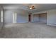 Very spacious bedroom with neutral paint, carpeted floors, and two entry doorways at 161 Jodi Pl, Locust Grove, GA 30248
