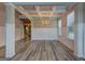 Spacious dining area with a coffered ceiling, stylish chandelier, and open floor plan at 161 Jodi Pl, Locust Grove, GA 30248
