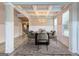 Elegant dining room featuring a coffered ceiling, stylish chandelier, and contemporary decor at 161 Jodi Pl, Locust Grove, GA 30248