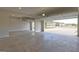 Spacious garage with bright lighting and smooth concrete floors at 161 Jodi Pl, Locust Grove, GA 30248