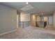 Large upstairs hallway with carpeted floors, neutral paint, and views of staircase at 161 Jodi Pl, Locust Grove, GA 30248