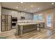 Well-equipped kitchen features stainless steel appliances and a large center island at 161 Jodi Pl, Locust Grove, GA 30248
