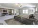 Large bedroom with vaulted ceiling, carpeted floors, windows, and neutral paint at 161 Jodi Pl, Locust Grove, GA 30248