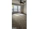 Bright bedroom with large windows and neutral carpet, offering ample natural light at 125 Laney Ct, Mcdonough, GA 30252
