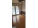 Dining room with hardwood flooring and a sliding glass door for outdoor access at 125 Laney Ct, Mcdonough, GA 30252