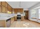 Bright kitchen with stainless steel appliances and light wood vinyl flooring at 125 Laney Ct, Mcdonough, GA 30252